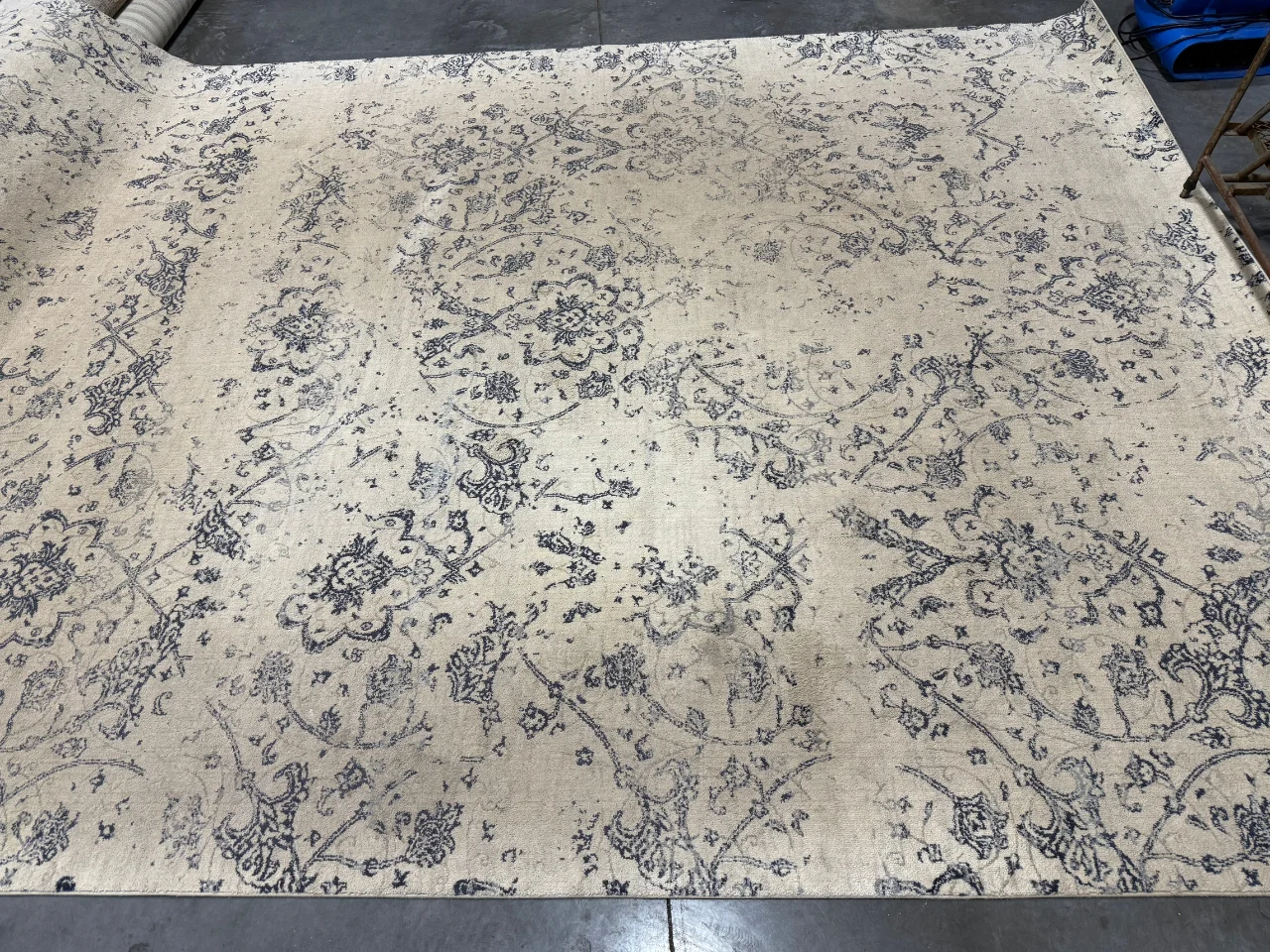 The silk 8x10 rug on arrival at the Benchmark plant