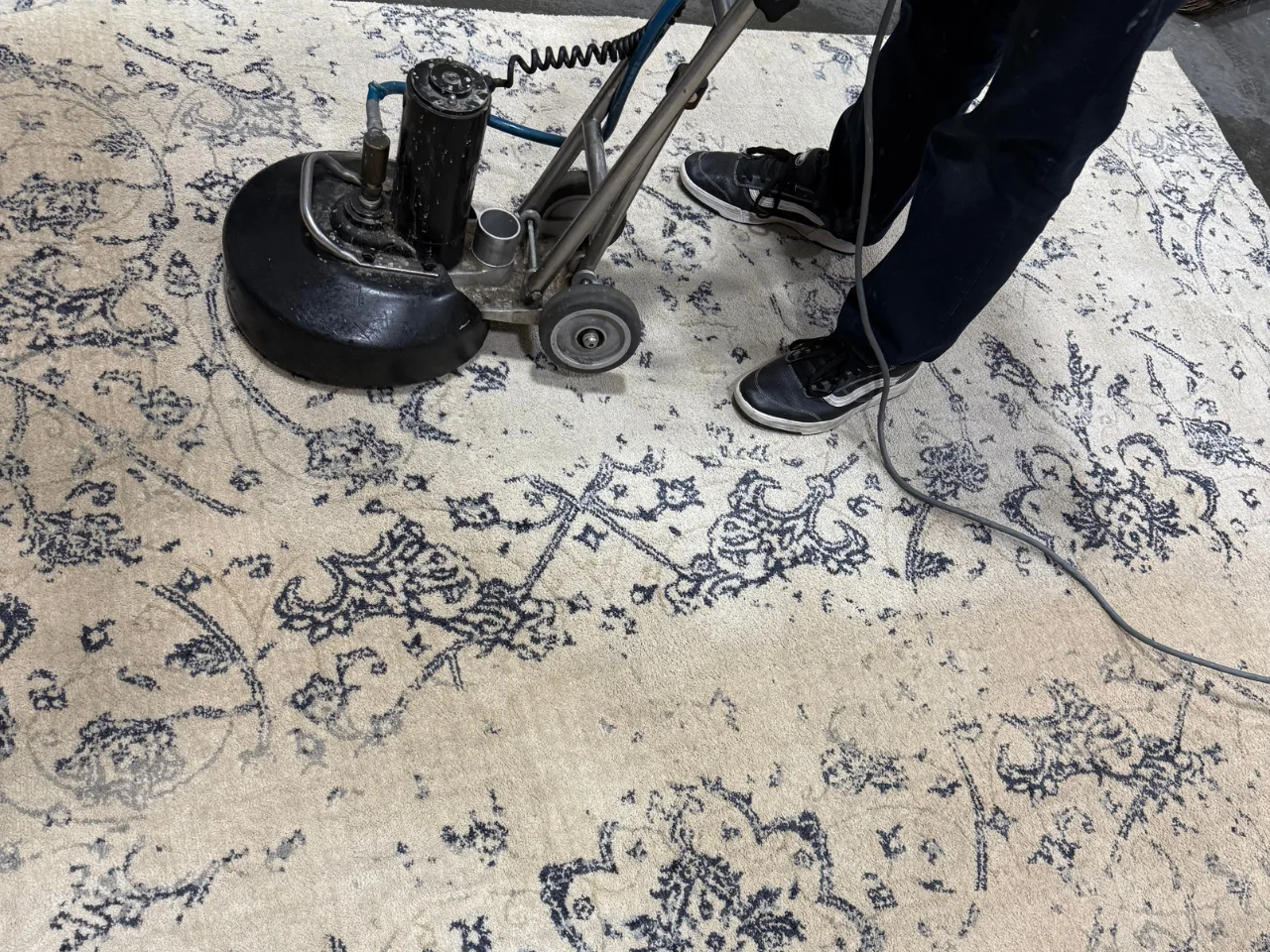 The silk 8x10 rug during the cleaning process at the Benchmark plant
