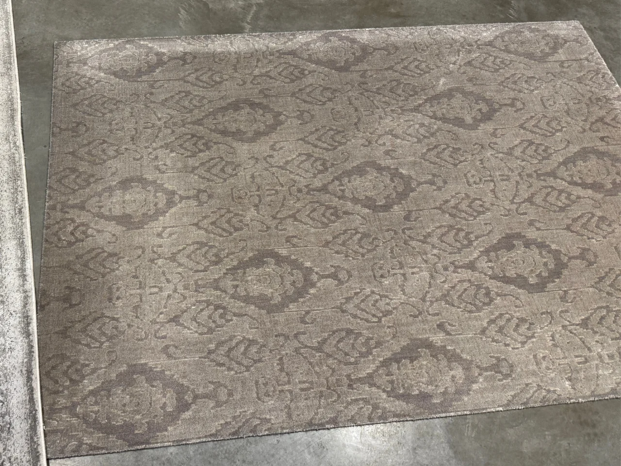 The silk rug during inspection at the Benchmark plant